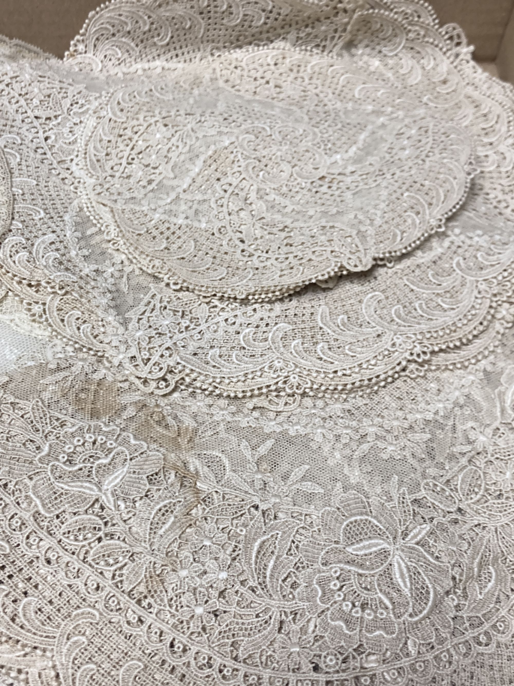 A set of Normandy lace table mats and assorted mats